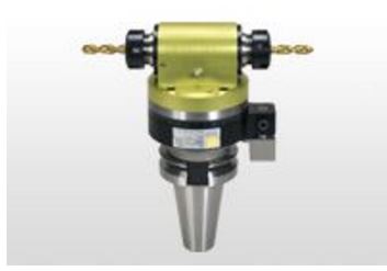 Tête à renvoi d'angle